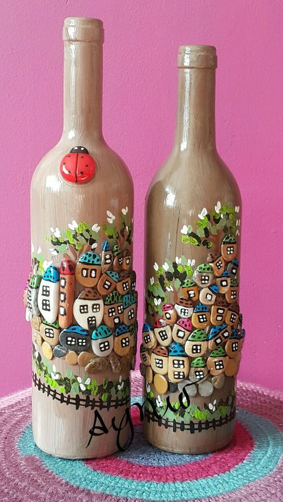 garrafas de vidro decoradas com pedras do rio